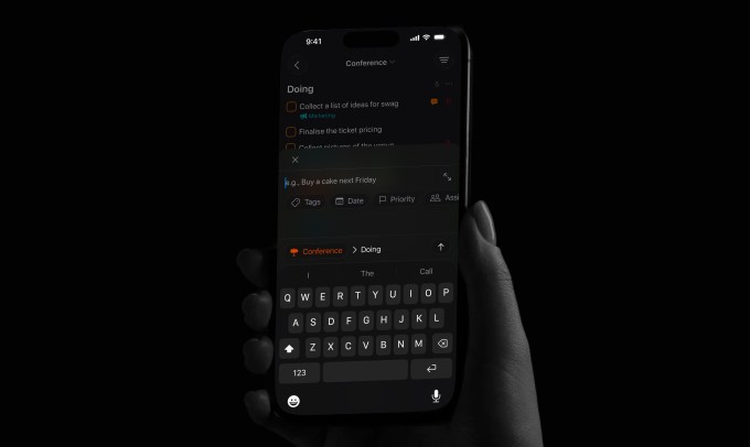 This is a lifestyle shot of Tasks app showing screen with a new feautre that uses local models to suggest tags when you enter a task.